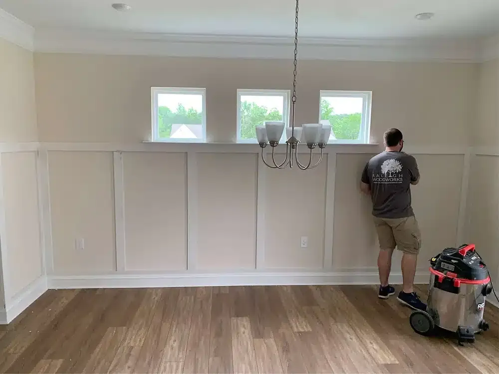 A carpenter at work in a residential home