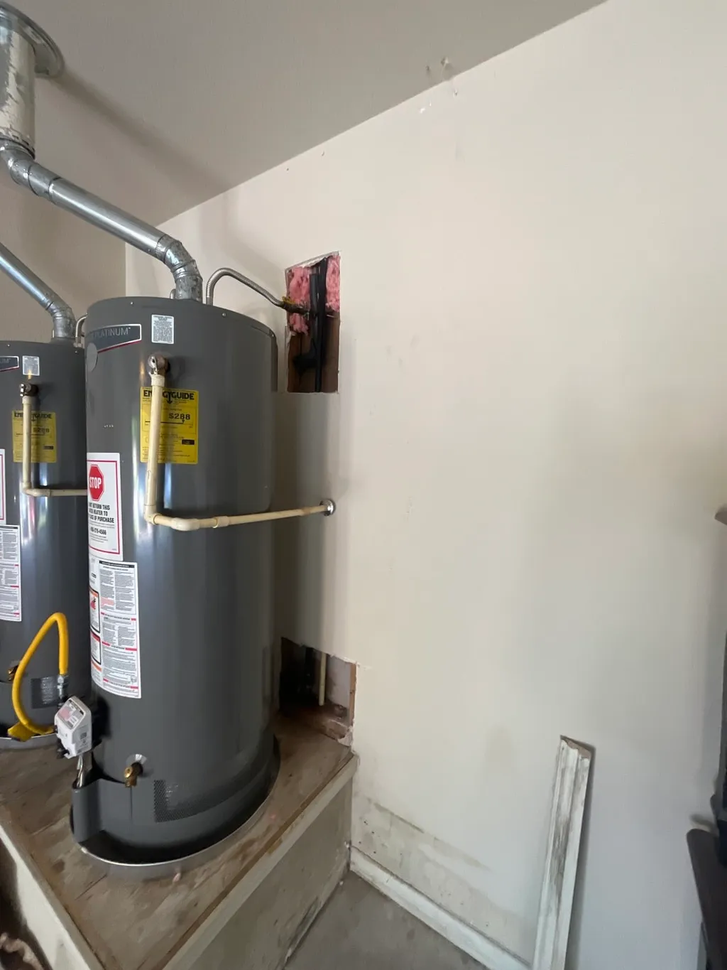 Drywall Repair & Insulation (Water Heater Area)